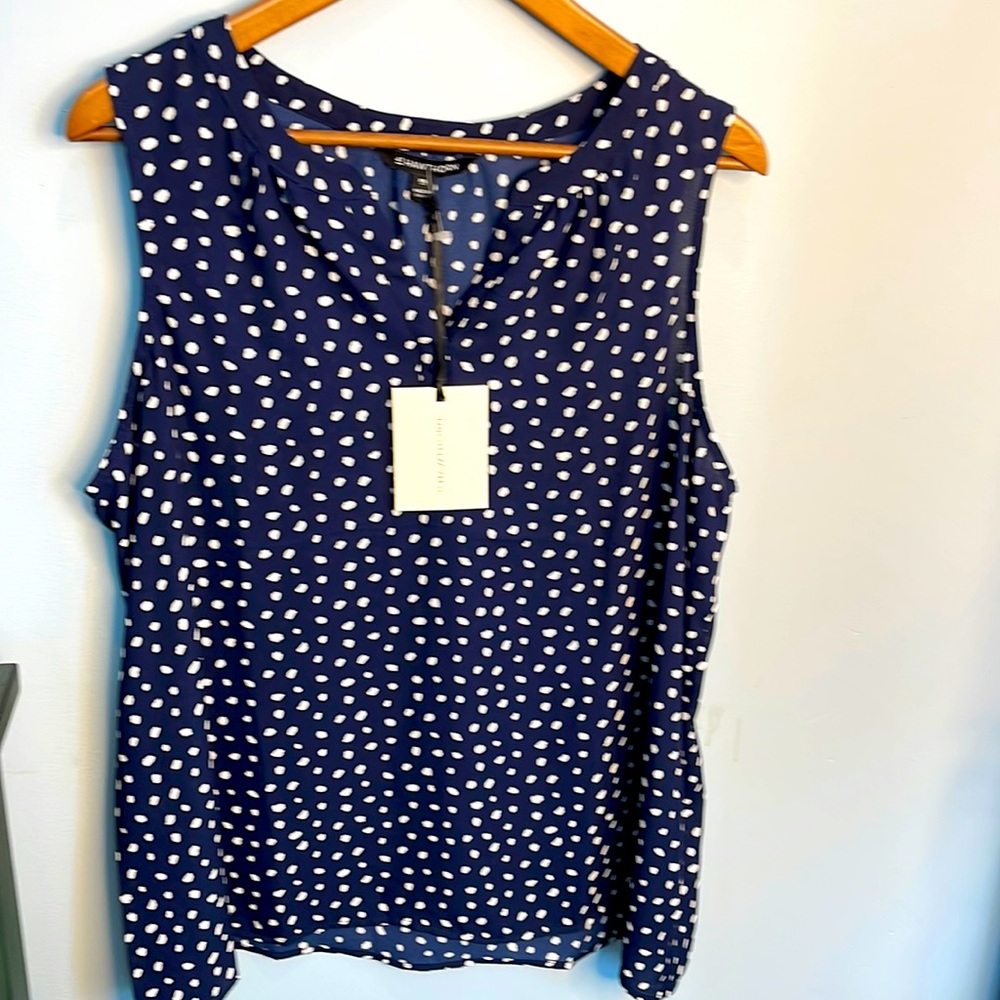 Brand new navy/ivory sleeveless blouse. Size XXL NWT